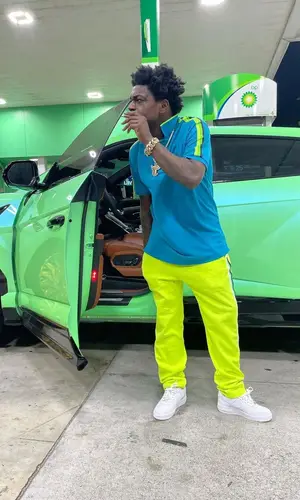 Kodak Black wearing Psycho Bunny shirt