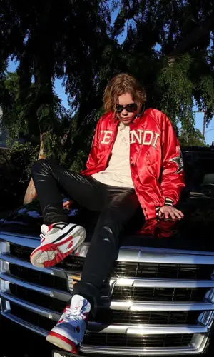 The Kid Laroi wearing Saint Laurent pants