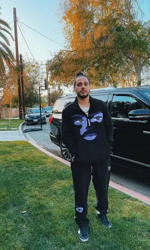 Russ wearing Puma top