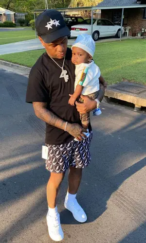 Rylo Rodriguez wearing Amiri shorts