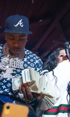 DaBaby wearing Amiri jeans