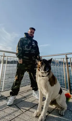 J Balvin wearing Supreme pants