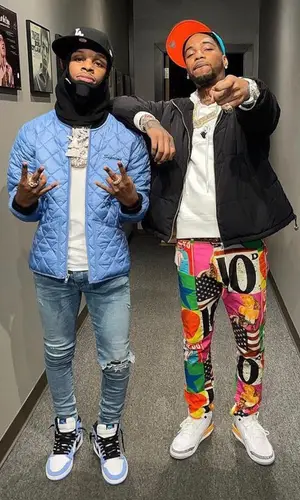Toosii wearing Supreme jacket