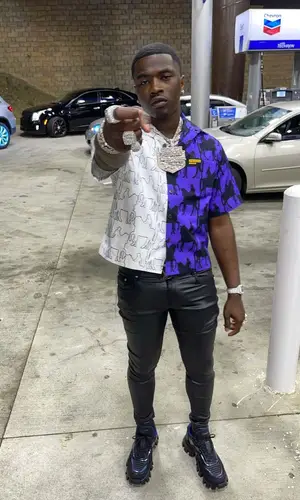 Bankroll Freddie wearing Prada shirt