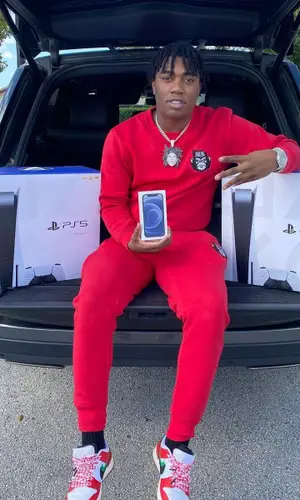 Fredo Bang wearing Bang Biz Clothing sweatshirt