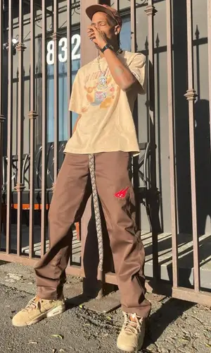 Travis Scott wearing Jordan sneakers