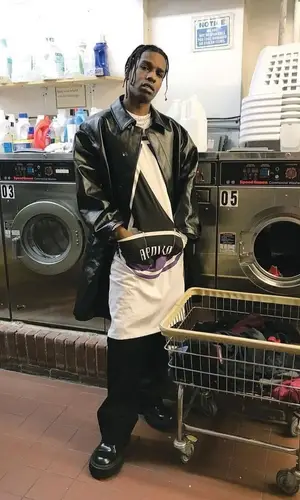 ASAP Rocky wearing Prada trousers