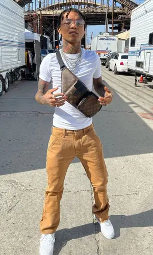 Swae Lee wearing Louis Vuitton bag