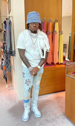 Gunna wearing Alanui hat