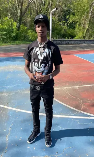 Yung Mal wearing Embellish NYC jeans
