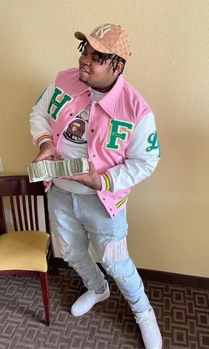Big Yavo wearing Homme + Femme jeans