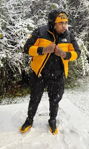 Big Yavo wearing The North Face hat