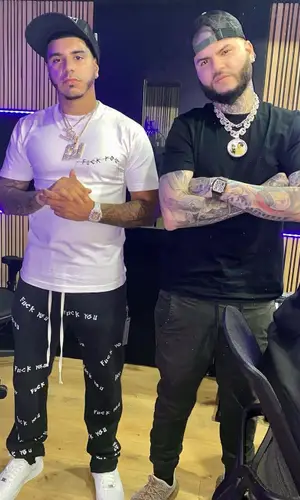CJ wearing For Those Who Sin t-shirt
