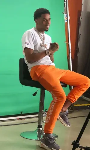 Pooh Shiesty wearing Chrome Hearts pants