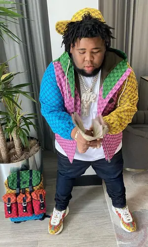 Rod Wave wearing Gucci jacket