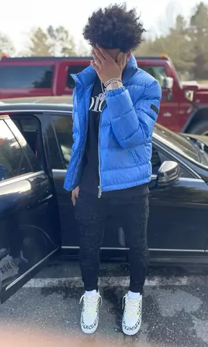 Mikey wearing Dior jacket