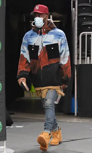 Kemba Walker wearing Palm Angels jacket