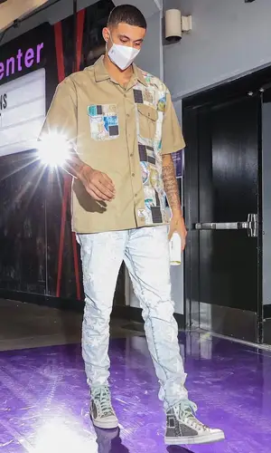 Kyle Kuzma wearing Axecents by Orah Lemaitre shirt