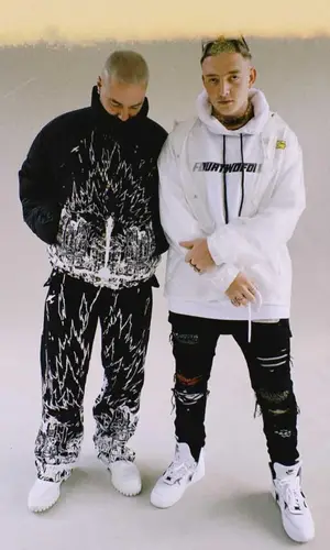 J Balvin wearing Louis Vuitton boots