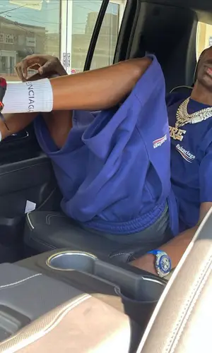 Young Dolph wearing New Era cap
