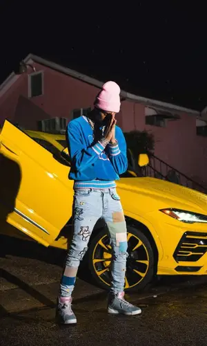 Key Glock wearing Gucci sweatshirt