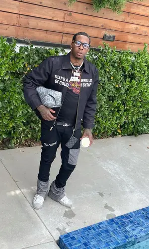 Lil Duke wearing Chrome Hearts eyewear