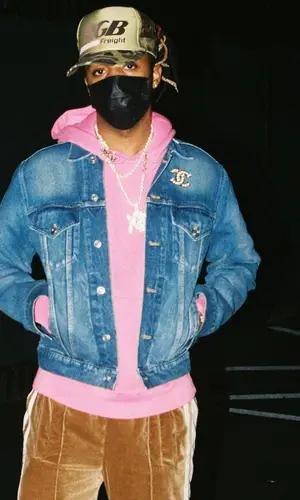 Metro Boomin wearing Chanel jewelry