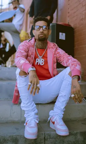 PnB Rock’s Outfit in Off-White T-Shirt, Bape Hoodie & Nike Sneakers (2021)