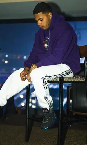 Myke Towers wearing Givenchy hoody