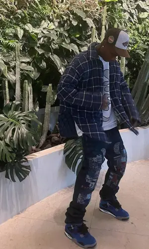Travis Scott wearing Jordan sneakers