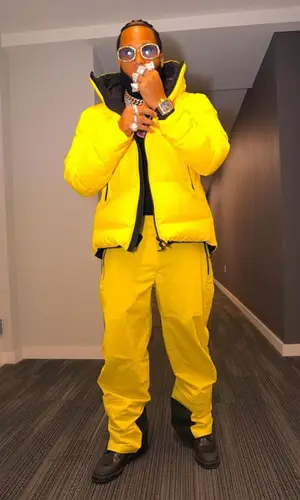 El Alfa El Jefe wearing Dior boots