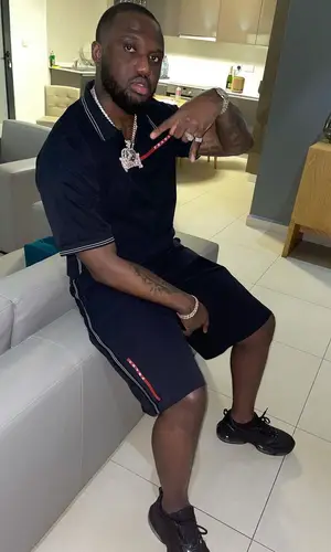 Headie One wearing Prada shirt