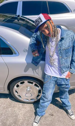 Tyga wearing Chrome Hearts hat