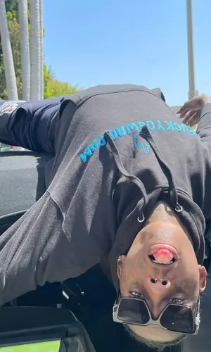 Famous Dex wearing FuckYouSwag hoody