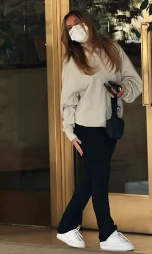 Addison Rae wearing Saint Laurent wallet
