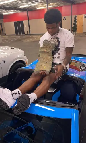 Rylo Rodriguez wearing Bape shorts
