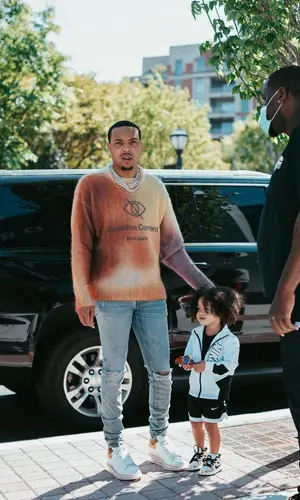 G Herbo wearing Palm Angels sweater