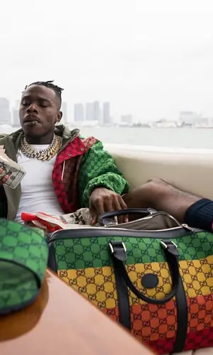 DaBaby wearing Gucci sandal