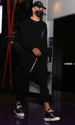 Kyle Kuzma wearing Karl Lagerfeld cap