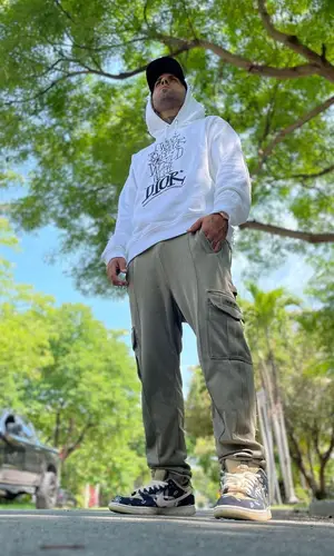 Nicky Jam wearing Dior hoody