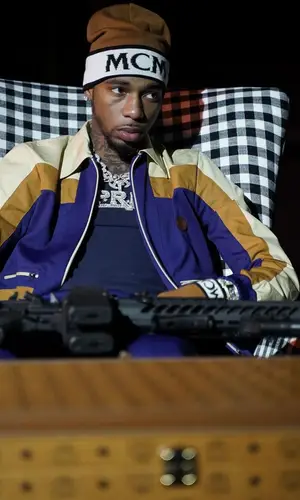 Key Glock wearing MCM glov