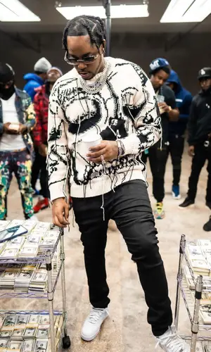 Fivio Foreign wearing Alexander McQueen sweater