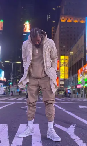 Iman Shumpert wearing John Geiger sneakers
