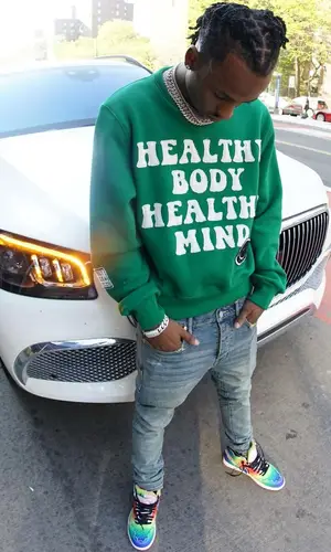 Rich The Kid wearing Amiri sweatshirt