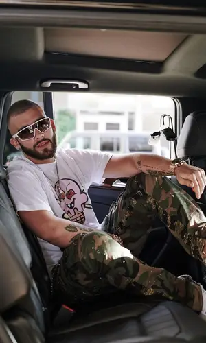 Manuel Turizo wearing Prada eyewear