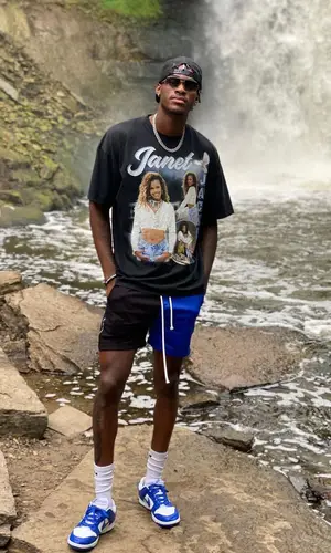 Jarred Vanderbilt wearing Grace Court Co t-shirt