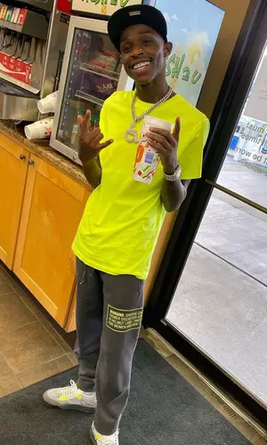 Quando Rondo wearing New Era cap