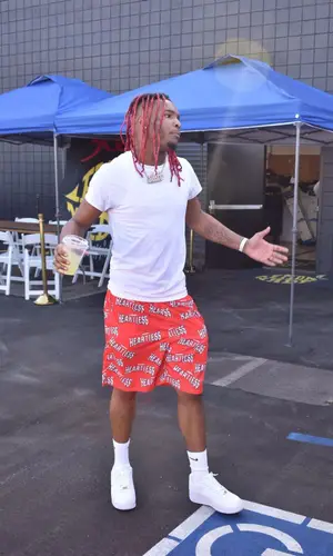 Lil Keed wearing Hanes t-shirt