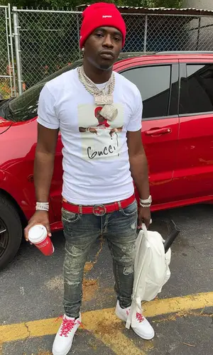 Bankroll Freddie wearing Supreme bag