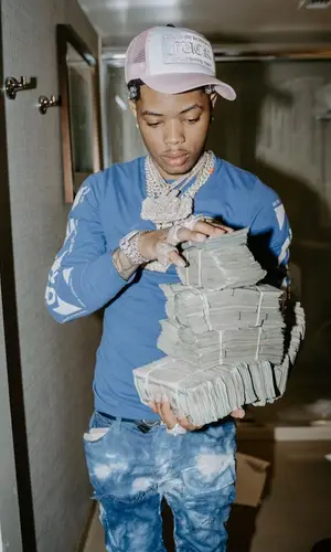 Lil Migo wearing Off-White sweatshirt